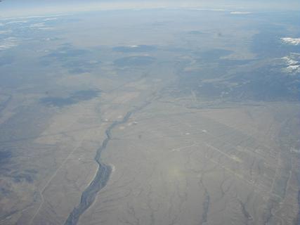 Rio Grande River and canyon<br>Location: <a href="https://www.google.com/maps/search/?api=1&query=36.37154,-105.68352" target="_new">Over New Mexico</a>
